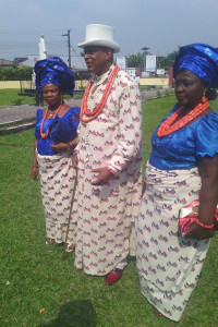 An Okrika father flanked by his two wives during the Iya of his daughter