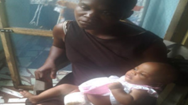 The mother of the kidnapped baby being united with her child